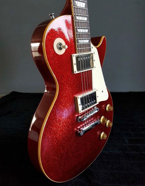 

custom electric guitar, metalic red sparkle, solid maple cap, binding/cover frets end,