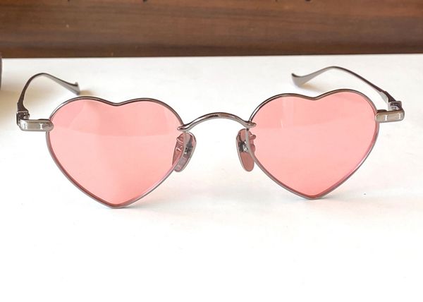 Occhiali da sole a forma di cuore rosa Montatura in metallo Sunnies Sonnenbrille Occhiali da sole alla moda da donna Tonalità Protezione UV400 con scatola