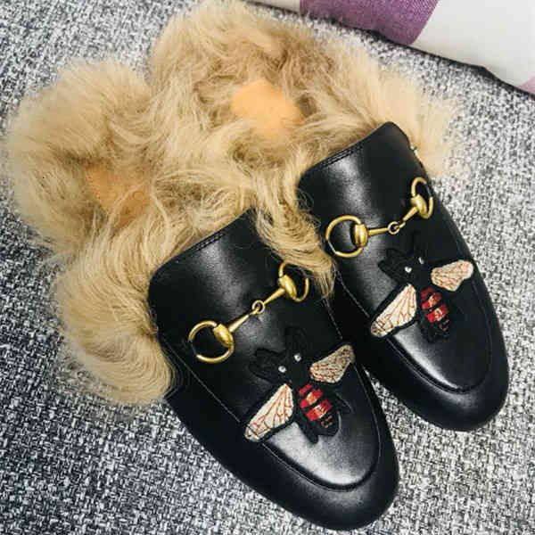 

fashion society princetown slippers are made of leather, fully lined with wool plush embroidery and horsebits for men', Black