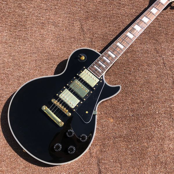 

electric guitar,rosewood fingerboard,white binding,gold hardware