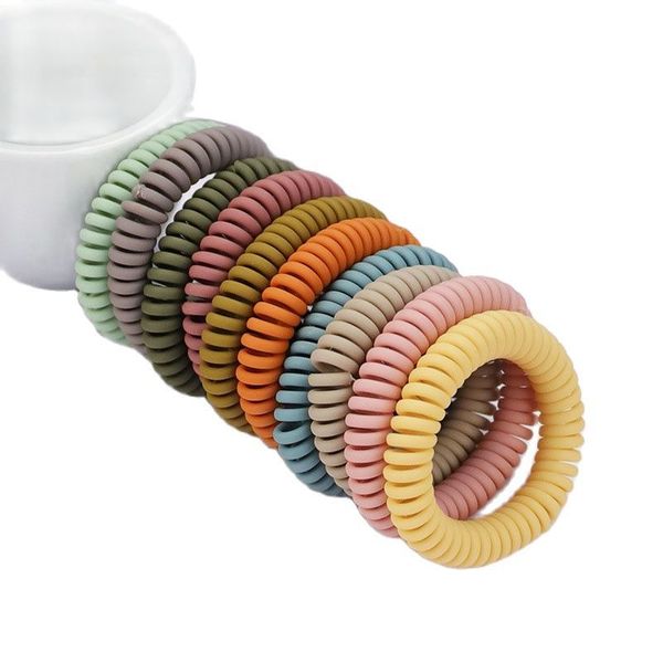 Intero 100 Pcs Grande Filo Del Telefono Elastici Elastici Colori Della Caramella Glassato Spirale Coil Corde Legami Dei Capelli Solidi