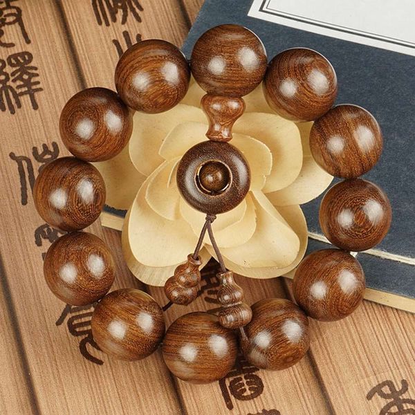 

golden sandalwood bracelet with multi circle buddha beads, Black
