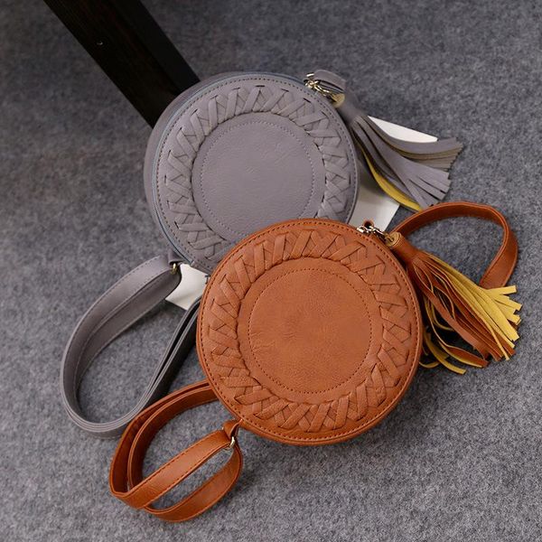 

backpack style circle casual shoulder adjustable tassels small round bag