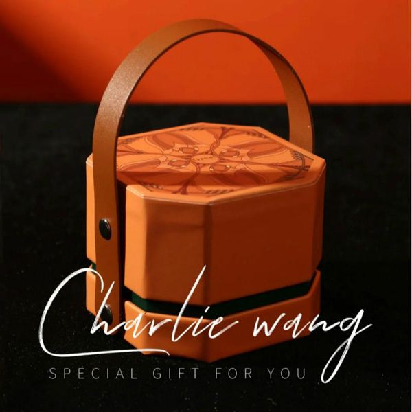 

gift wrap octagon orange biox with pu leather handle luxury present packaging boxes wedding party favors box