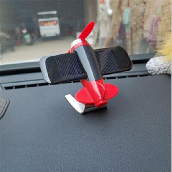 

car perfume air freshener on dashboard little plane styling with solar powered wings no need battery