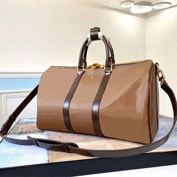 

45 50 55cm luxury handbags large capacity womens travel bags leather fashion designer mens shoulder duffel bag on luggage bottom rivets with