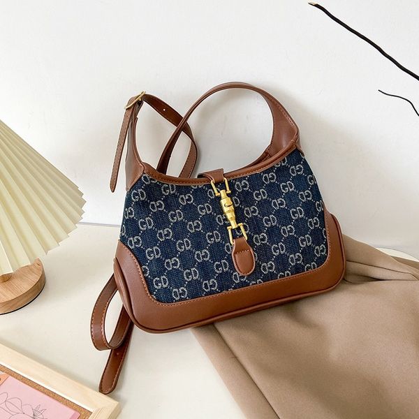 

designer handbags bag female autumn 2021 new korean version fashion letter one shoulder armpit foreign temperament messenger bag