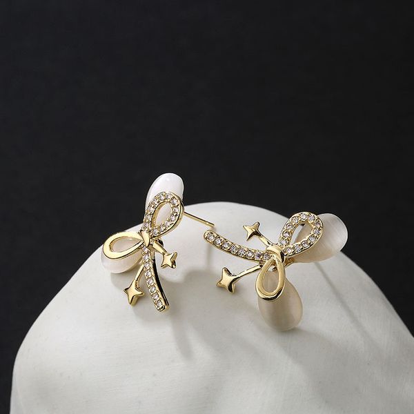 

70% off luxury jewelry s925 silver needle earrings, japanese atmosphere, individual bowknot, cat's eye, stone ear jewelry, temperament,, Golden;silver