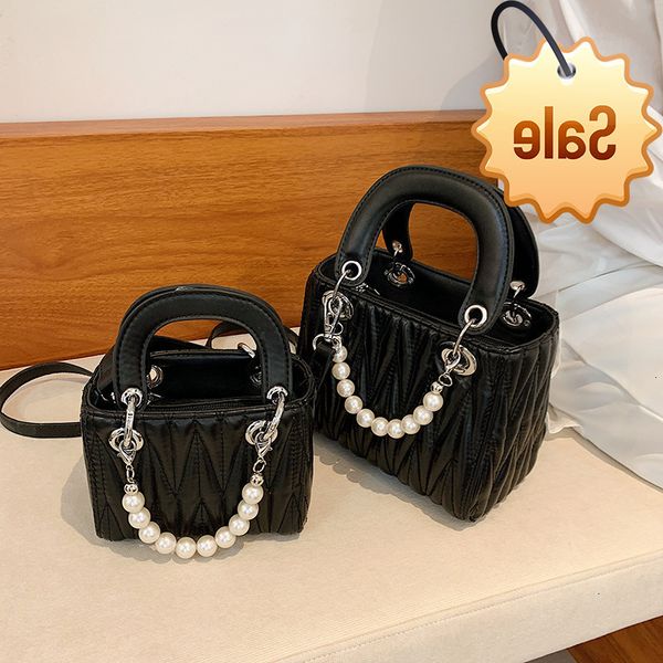 

2021 new women's temperament pearl diana solid color texture single shoulder messenger bag simple embroidered thread handbag