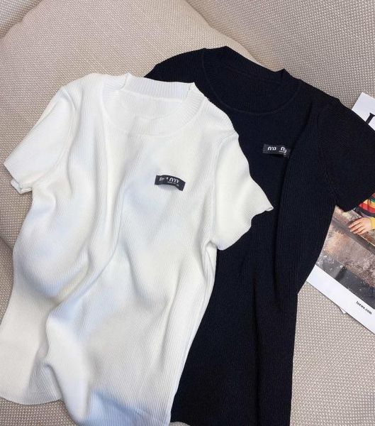 

Fashion revealed a little bit of Sexy Stretch Fabric behind the hollow chain knitted T-shirt, White;black