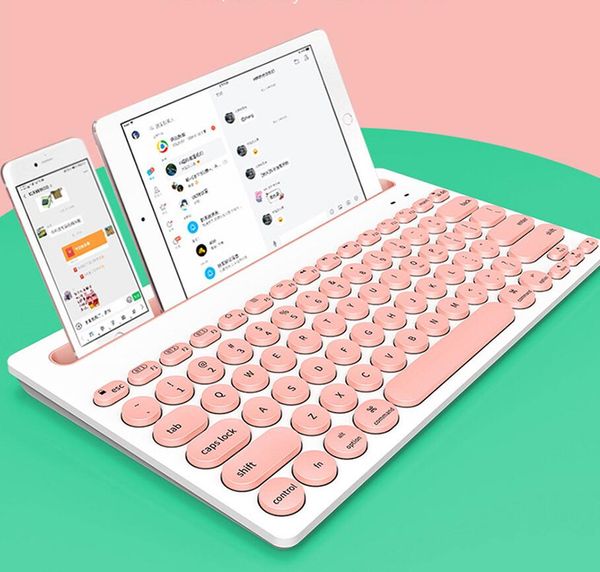 

multi-device bluetooth wireless keyboard mini 76 keys for tablet phone lapkeypad portable optical pink black with retail box