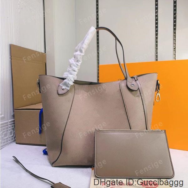 

hina totes bag double handles leather handbag hollowed-out flower crossbody messenger saling shoulder bags m54354