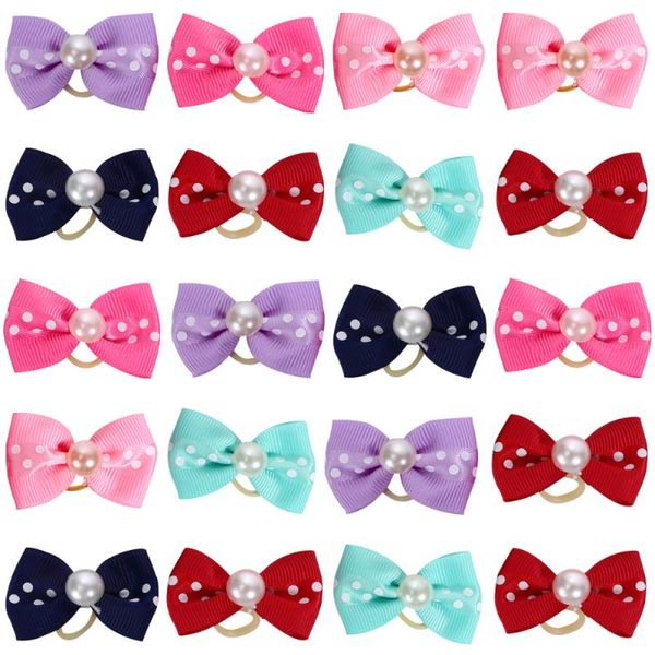 

20pcs elastic pet hair bands bowknot shaped fashionable dog cat bows costumes
