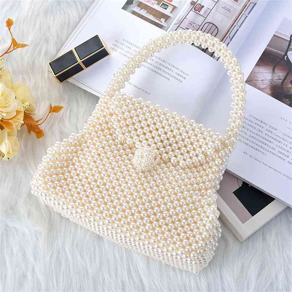 

new ins niche design hand woven holiday bride dinner pearl handbag women's bag