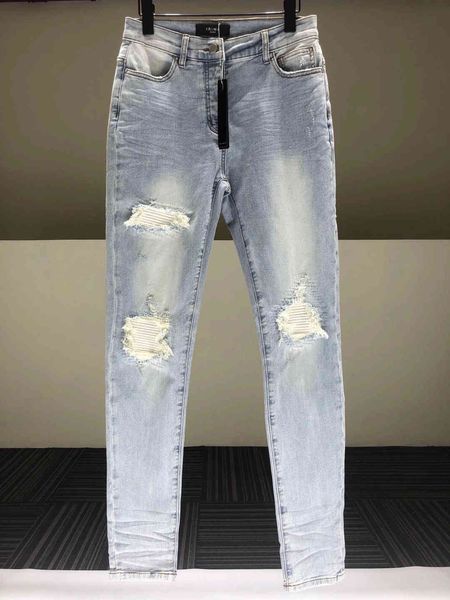 

correct version of am20 style high street light blue with white leather double knee holed slp jeans