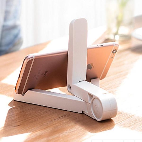 

cell phone repairing tools shows the general lazy triangle deskfolding tablet holder
