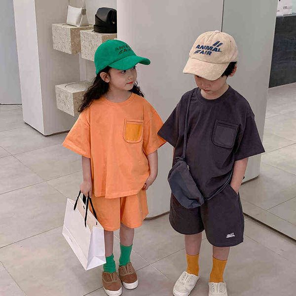 

summer kids solid color cotton clothes sets children short sleeve pockets t shirts and short 2pcs outfits y220310, White