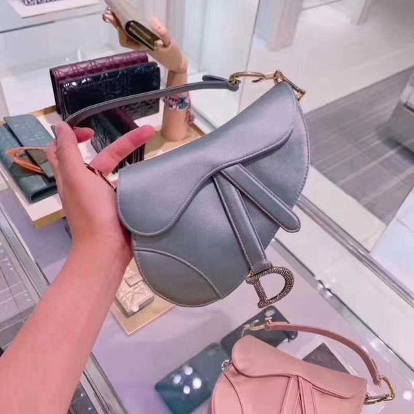 

flower di haze blue satin saddle bag
