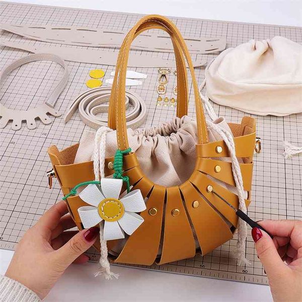 

2021 idyllic style semi-circular saddle leather hand-held messenger hand woven diy material bag made by women luxuryss designerss yw