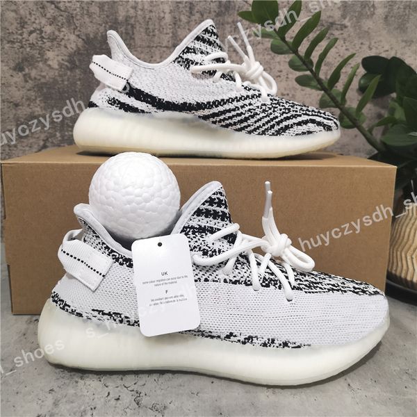 

2021 designer men women kanye west running shoes luxury black zebra reflective outdoor trainer sneakers us 4-13 contains half size
