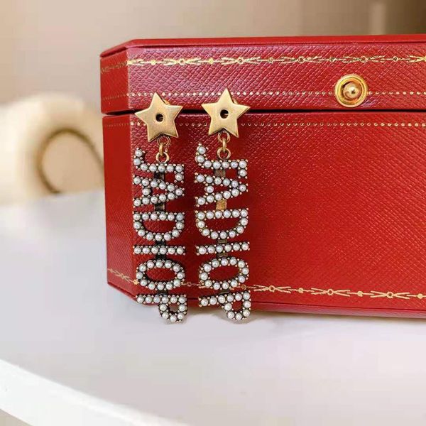 

aaa designer jewelry pearl letter earrings gong tingfeng, Golden