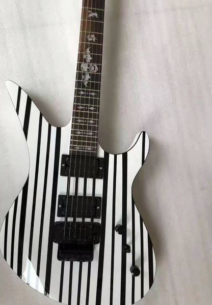 

electric guitar body mahogany skeleton inlay,tremolo bridge black hardware
