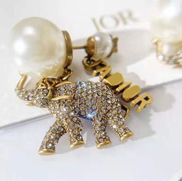 

special offer 70% off luxury jewelry di female pearl elephant asymmetric earrings, Golden