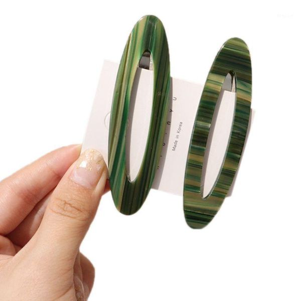 

minimalist womens metal alloy bb hair clips hollow oval shape luster hairpins textured leopard colored decorative snap barrettes1