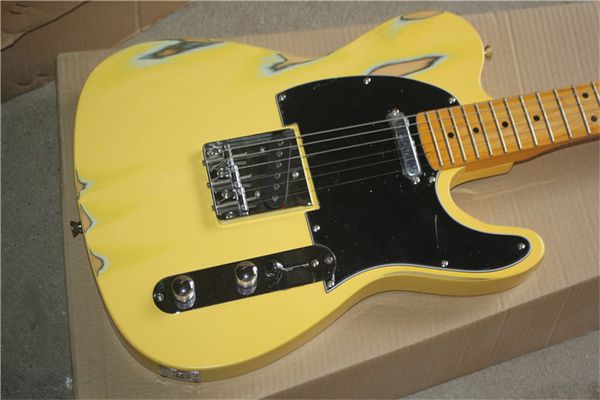 

relic tl electric guitar with yellow color