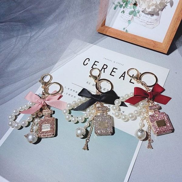 

keychains stylish perfume bottle shape imitation pearl chain bowknot keychain tassels hanging ring bag key adornment women jewelry gifts, Silver