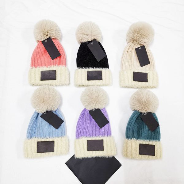 Cappelli invernali per bambini in pelliccia di alta qualità firmati con pon pon di pelliccia per cappelli da donna berretti in maglia per bambini 1-12 anni