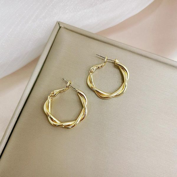 

the simple twisted twist small earrings temperament cold wind design metal circle female stud, Golden;silver