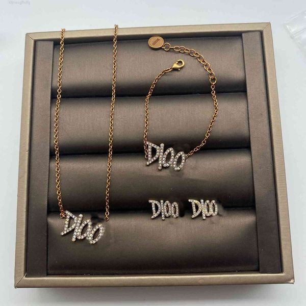 

christian/dio necklace dijia / d letter bracelet set net red same temperament earrings women brass material, Red;brown