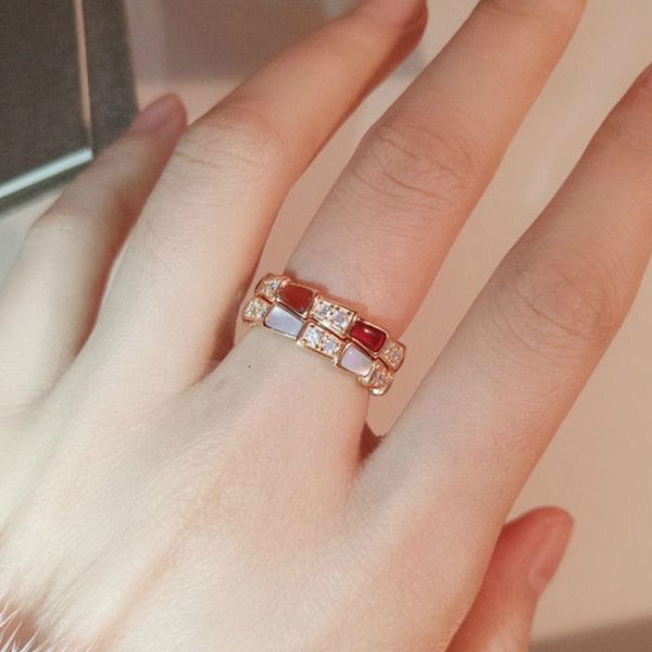 

mainstream design sense fashion baojia snake bone ring sterling silver plated 18k gold single row shaped white fritillaria narrow version in