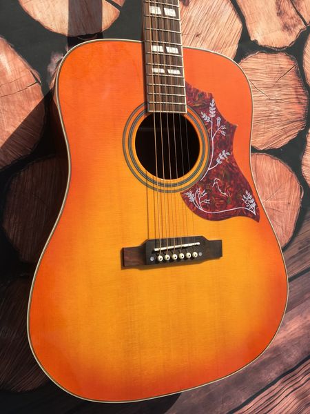 

new 2022 41" 6-string acoustic guitar with spruce and rosewood back.