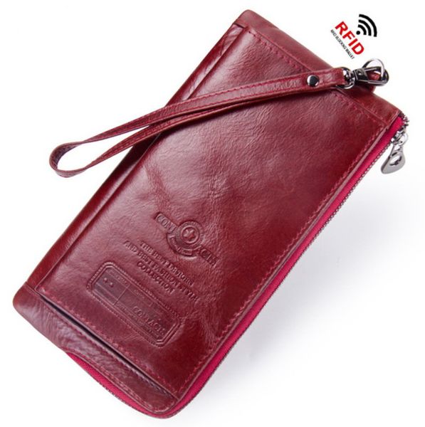 

leather lady's purse hand bag cowhide and wrist strap, Red;black