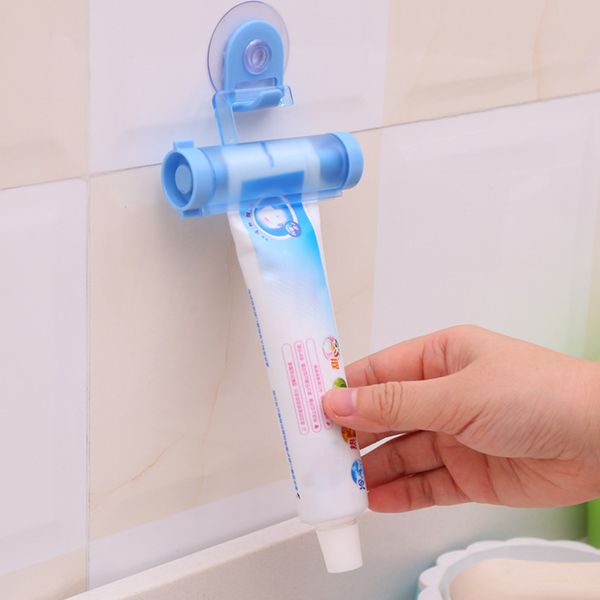 

1pcs with sucker hook portable multi purpose plastic reuse rolling squeezer toothpaste dispenser manual bathroom accessories