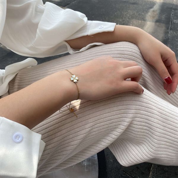 

simple stainless steel four leaf inlaid shell sliding buckle women's bracelet woven bracelet lucky grass adjusting hand rope, Black