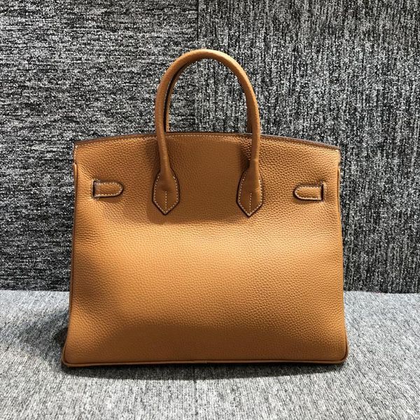 

essence welfare big bang season look at the first layer of cowhide women's bag