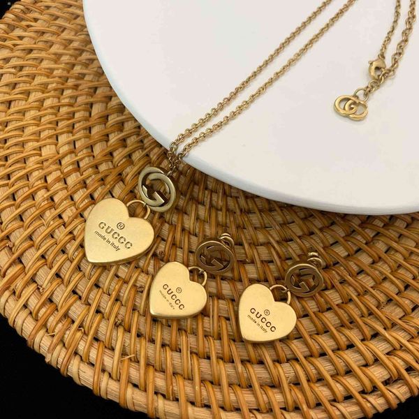 

design jewelry 2021 new love earrings and earrings women's double letter heart shaped brass necklace, Golden