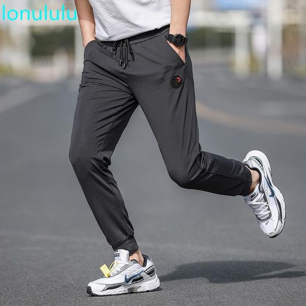

spring and summer 2021 men's small logo casual leggings korean slim fashion pencil pants, Black
