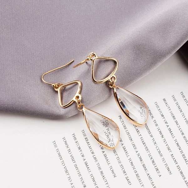 

s925 silver needle crystal geometric earrings are plated with 14k gold, simple ear hook style