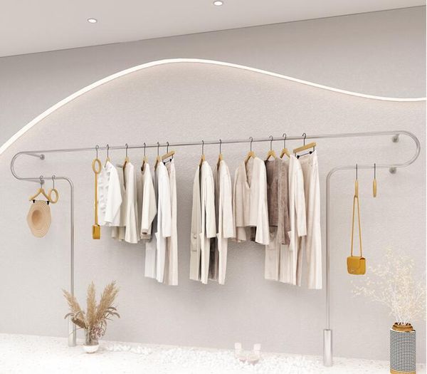 

hooks & rails stainless steel clothes rack hanging on the wall