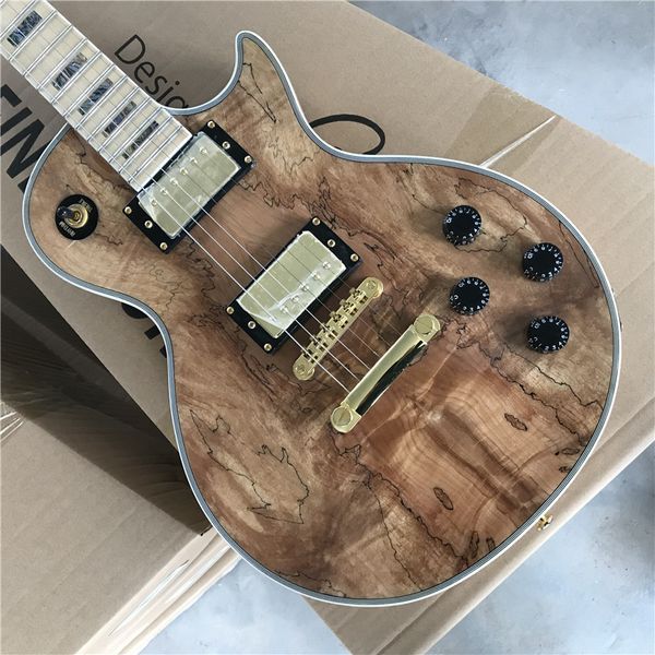 

custom high-quality electric guitar, natural wood color, maple fingerboard. gold parts,