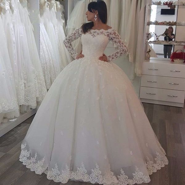 Linha glamourosa um vestido de noiva com mangas longas sem alças feitas de tule tule piso de marie