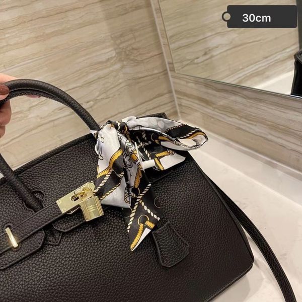 

women luxurys designers handbag women's big one shoulder portable messenger bag