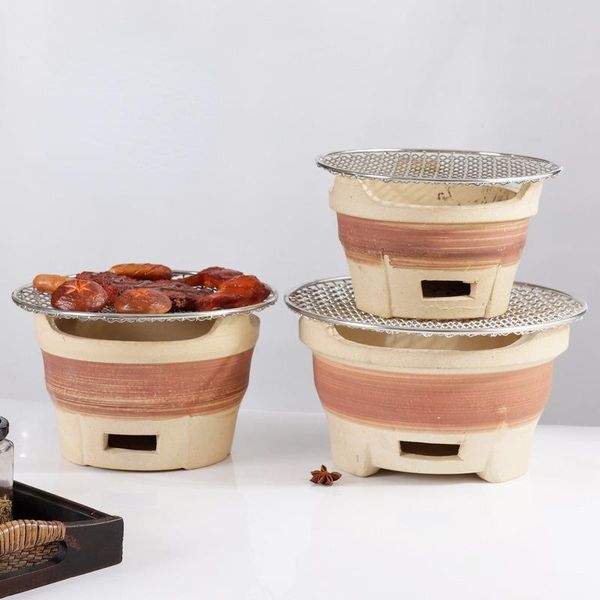 

parts earthenware barbecue small mud stove household outdoor field kebab old charcoal cooker