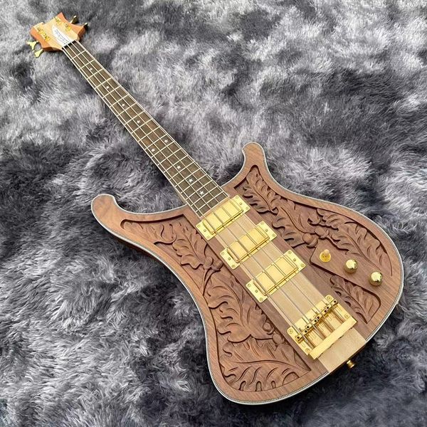 

this great electric bass. it is carved from precious walnut. it is exquisitely made and has beautiful timbre.