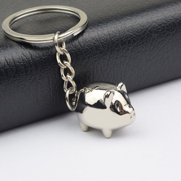 10 peças / lote bonito requintado pequeno porco keychain bolsa de moda acessórios charme acessórios criativos liga de carro chave titular animal pingente saco chaveiro