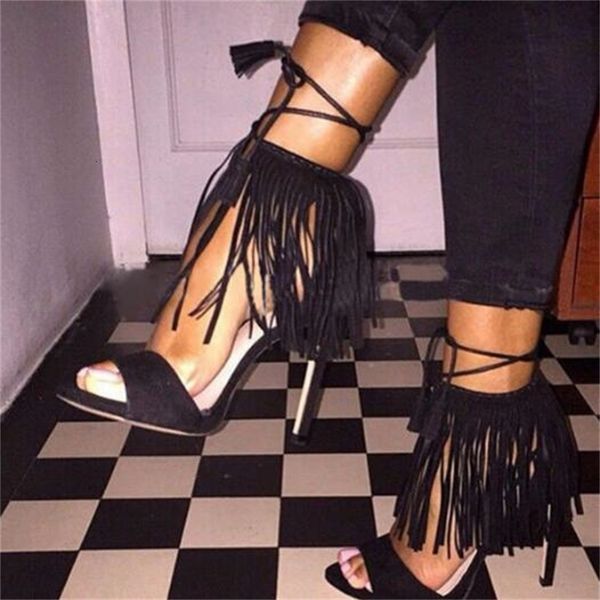 

sandals black summer suede fringe tassel lace up front woman peep toe leaping wearing shoes high heeled party j6oj